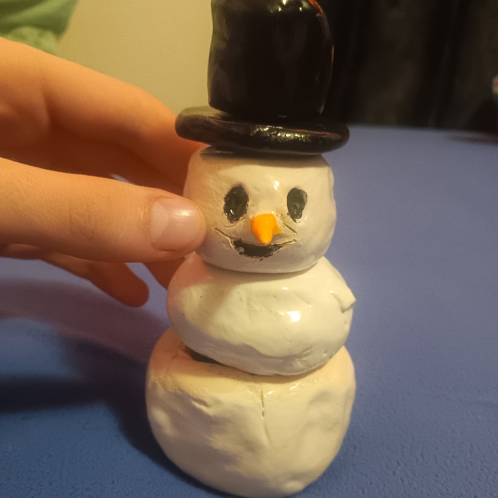Handmade snowman clay sculpture